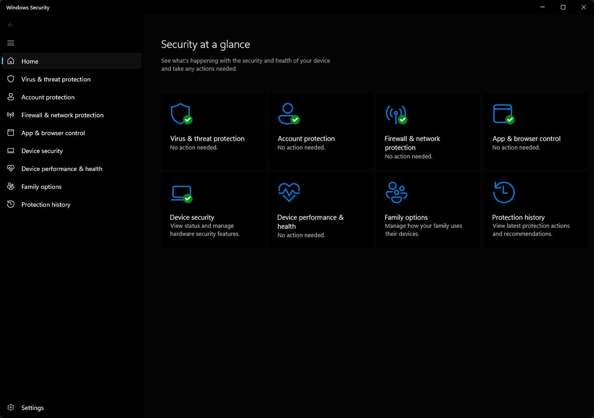 Windows Security app 'Security at a glance' dashboard in Windows 11 showing green check marks on Virus & threat protection, Firewall, App & browser control, and Device security