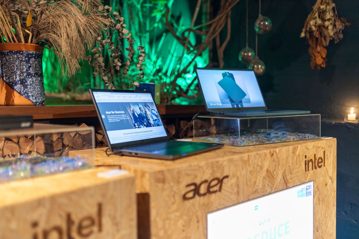 Windows laptops on a retail display stand with Acer and Intel branding, as seen when shopping for a new laptop