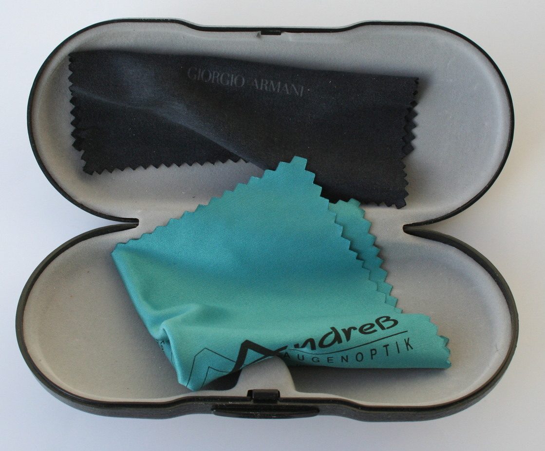 Two microfiber cleaning cloths, one teal and one black, stored inside a padded eyewear case
