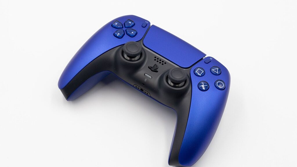A Cobalt Blue Sony DualSense PS5 controller on a white background, the wireless controller people troubleshoot when a PS5 controller is not connecting
