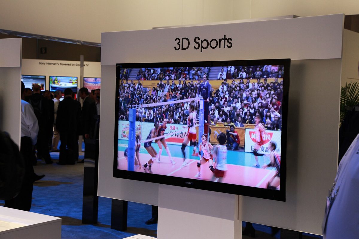 A Sony BRAVIA television on display at a trade show showing a bright sports broadcast, representing Sony's premium TV lineup