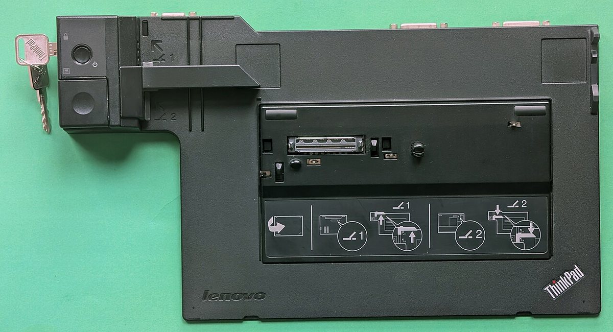 A laptop docking station that adds video outputs for external monitors, the kind that introduces its own detection problems like DisplayLink drivers and power
